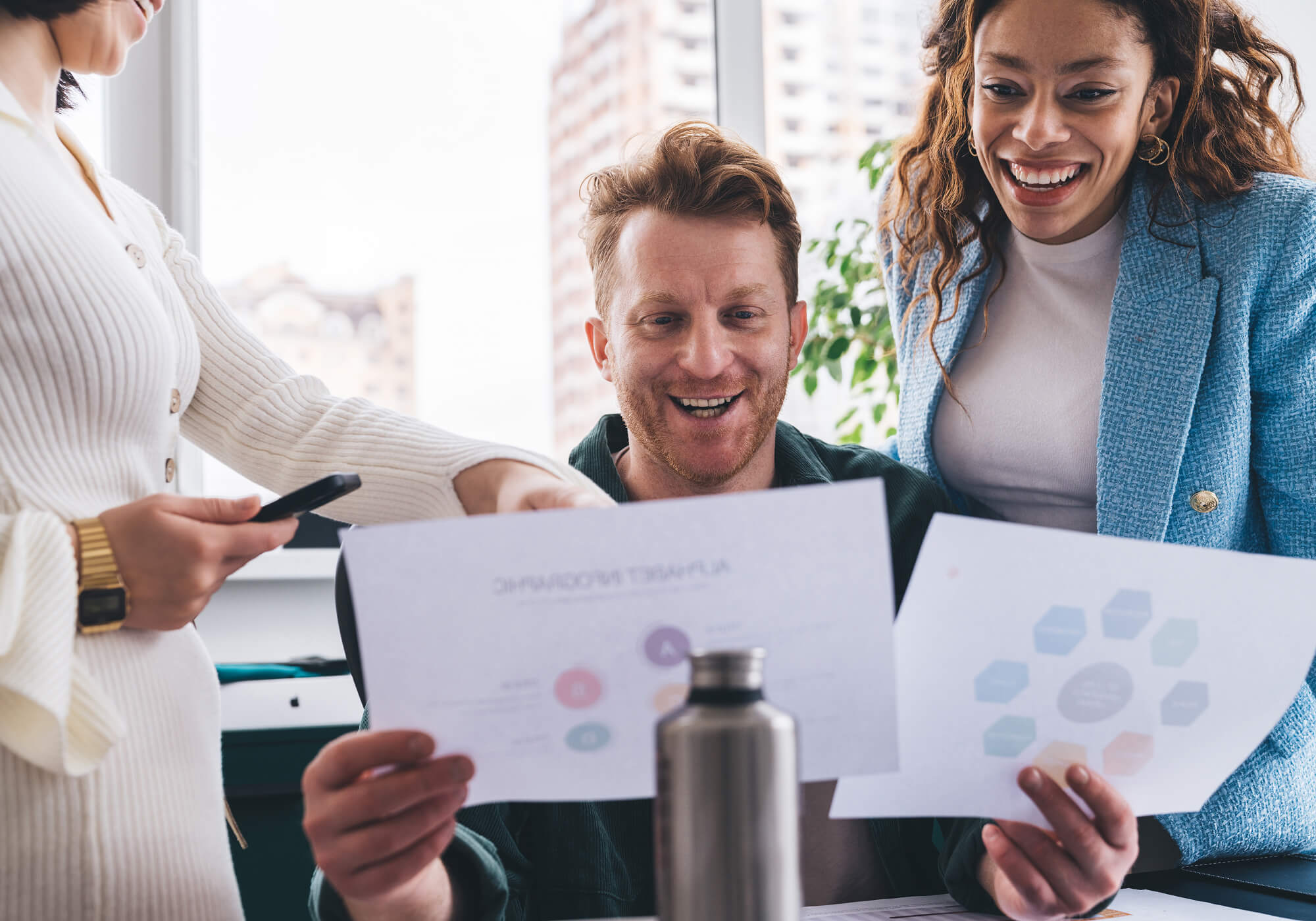 positive-colleagues-researching-business-diagrams-9PH3MB2.jpg